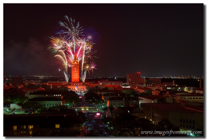 Fireworks light up the night over the Austin skyline and the UT Tower